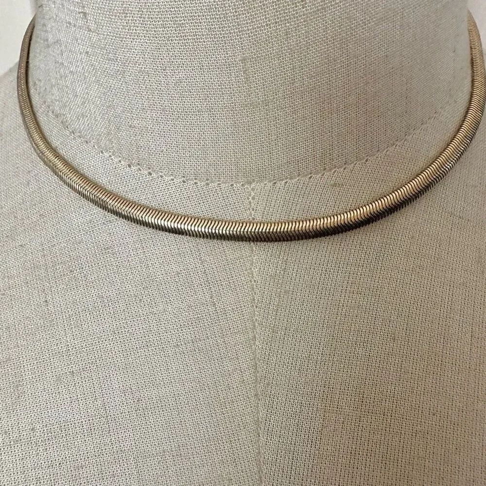 Gold tone choker necklace